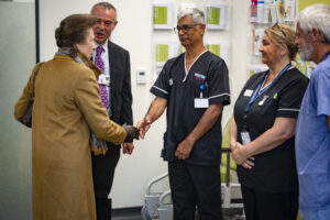 The Princess Royal shaking hands with endoscopy staff