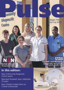 cover image of the Pulse magazine featuring a group of staff outside the new Community Diagnostic Centre