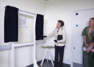 The Princess Royal unveils a plaque marking the visit